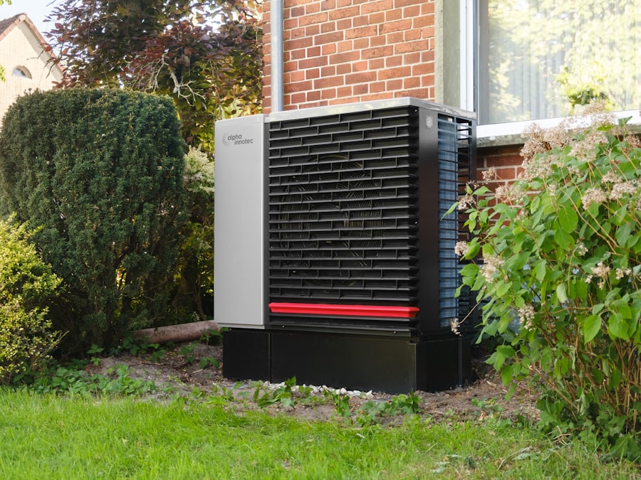 Outdoor heat pump unit next to a brick building