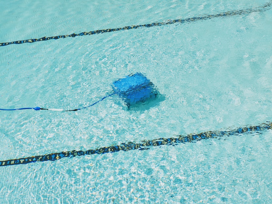 A robotic pool cleaner is working underwater