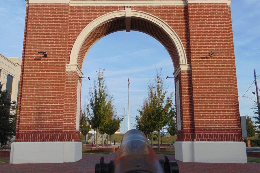 The brick memorial arch and cannon in Gretna's historic district