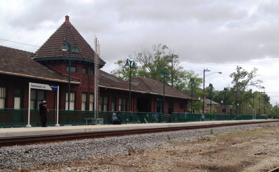 The Amtrak station in Hammond, a low station building beside the railway line