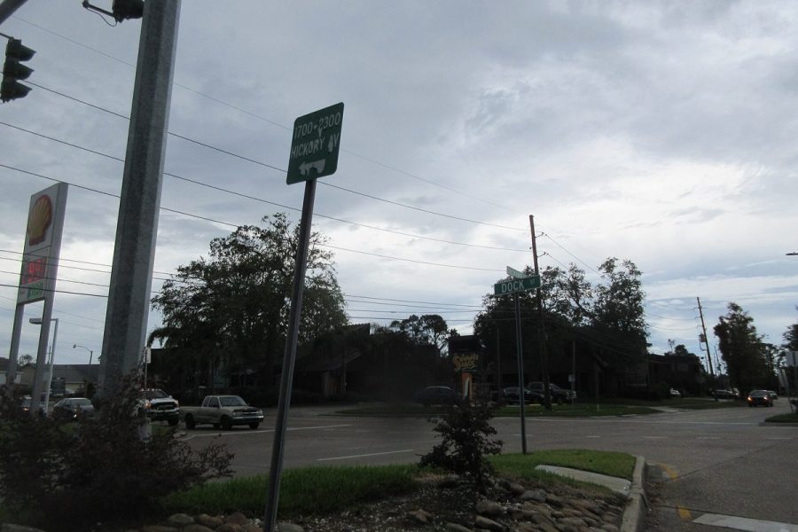 A tree-lined residential street corner in Harahan