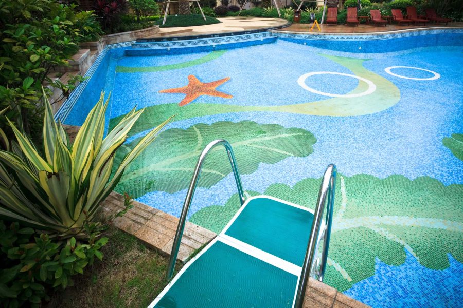 Mosaic tiled pool surface and entry steps